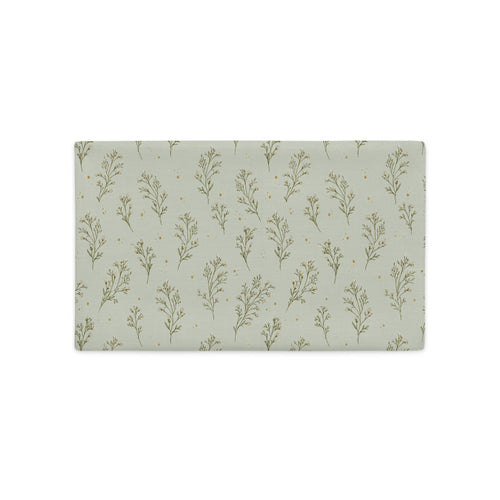 A rectangular pillow cover featuring a repeating pattern of muted sage green botanical stems and tiny gold dots on a light sage green background, shown flat against a white background.