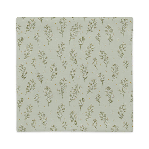 A square pillow cover with a repeating pattern of delicate olive green botanical stems on a muted sage green background, accented with tiny gold dots.