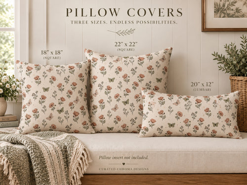 Four floral pillow covers displayed on a beige sofa in a styled room setting, with text overlays showing different sizes: 18" x 18", 22" x 22", and 20" x 12". The pillows feature a muted floral pattern on a warm cream background.