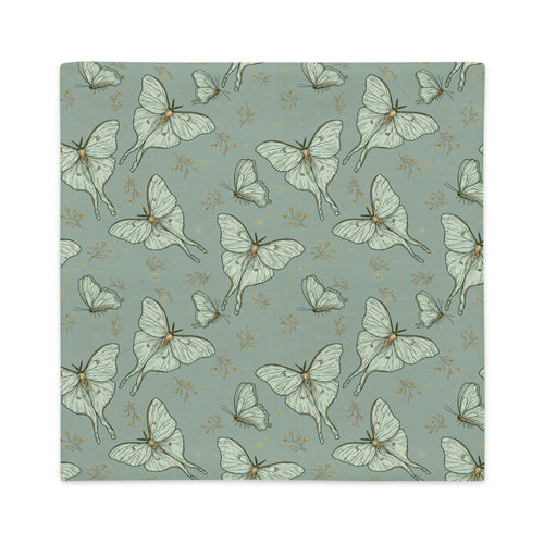 A square pillow cover with a repeating pattern of pale green butterflies and small gold floral details on a muted sage green background, shown against a plain white backdrop.